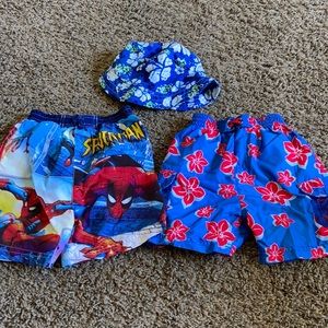 3T swim trunks with a bucket hat